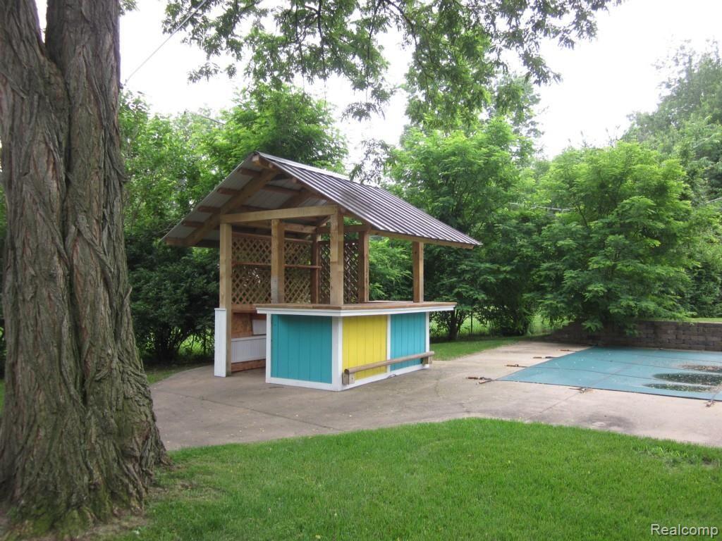 14151 Newburgh Road Livonia, MI 48150 - Photo 33 of 39 34 Backyard Tiki Bar.jpg