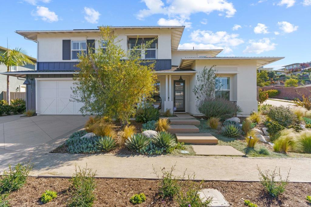 663 Polaris Drive Encinitas, CA 92024 - Photo 1 of 34 a front view of a house with garden