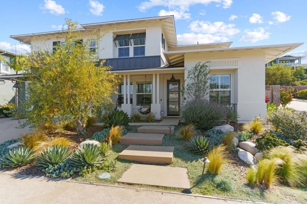 663 Polaris Drive Encinitas, CA 92024 - Photo 2 of 34 a front view of a house with plants