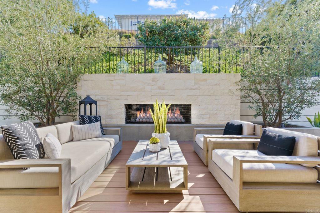 663 Polaris Drive Encinitas, CA 92024 - Photo 29 of 34 a terrace of a house with couches table and chairs