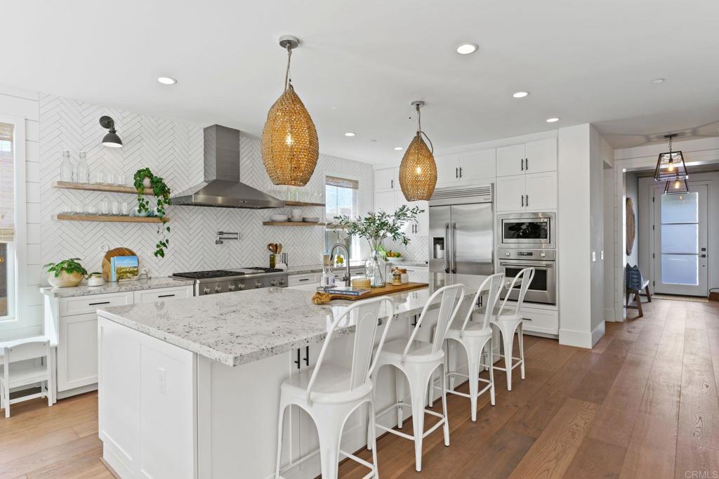 663 Polaris Drive Encinitas, CA 92024 - Photo 3 of 34 a view of kitchen with sink and wooden floor