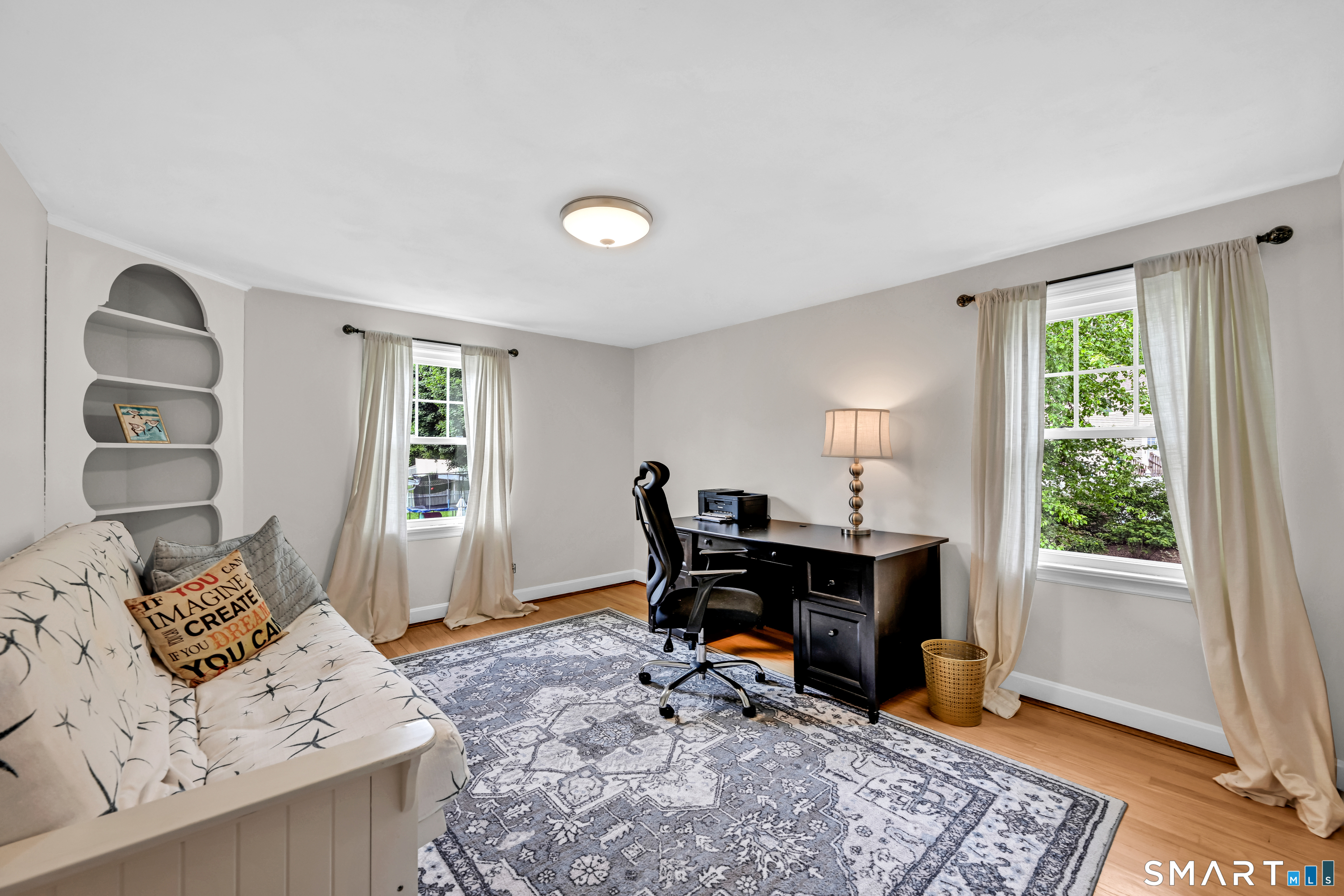 47 Spring Lane West Hartford, CT 06107 - Photo 22 of 38 a view of a workspace with furniture and a window