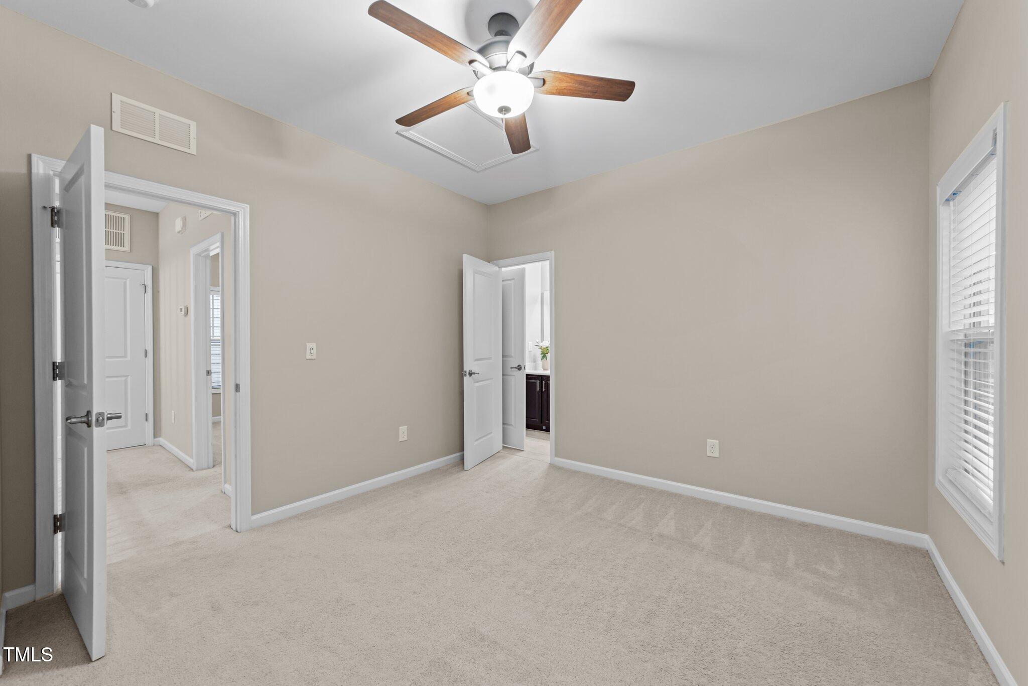 5644 Wade Park Boulevard Raleigh, NC 27607 - Photo 24 of 29 a view of an empty room and a window