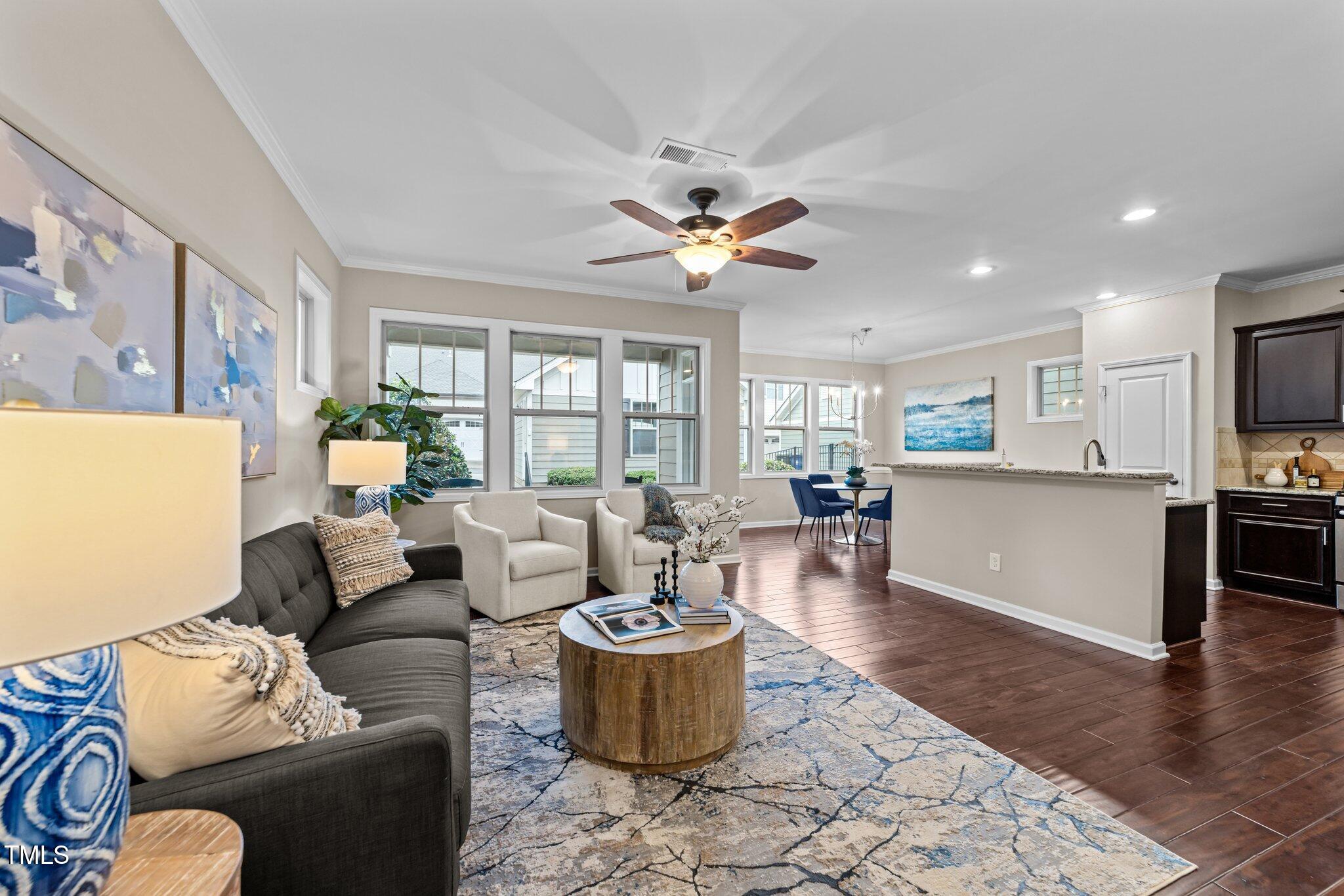 5644 Wade Park Boulevard Raleigh, NC 27607 - Photo 6 of 29 a living room with furniture and a large window
