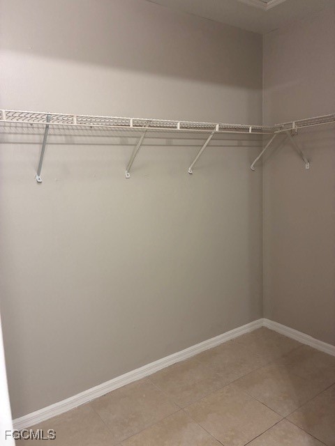 4522 20th Street Southwest Lehigh Acres, FL 33973 - Photo 3 of 9 a view of a room with racks on the wall