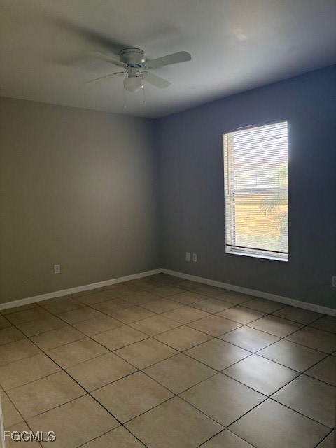 4522 20th Street Southwest Lehigh Acres, FL 33973 - Photo 5 of 9 a view of an empty room and a window