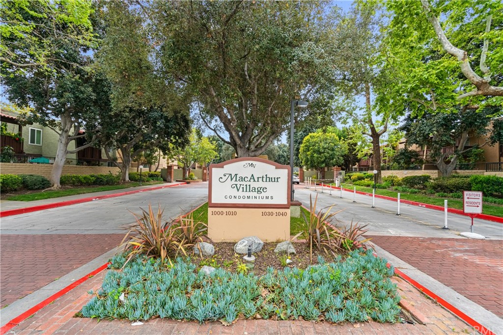 1040 West MacArthur Boulevard, Unit 104 Santa Ana, CA 92707 - Photo 1 of 30 a view of a park with large trees