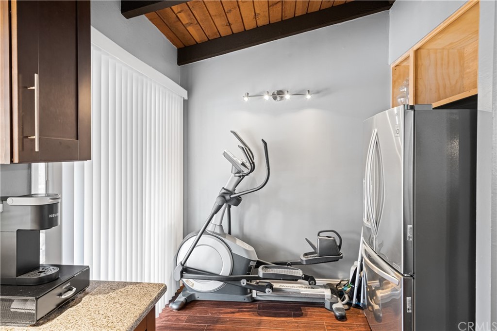 1040 West MacArthur Boulevard, Unit 104 Santa Ana, CA 92707 - Photo 11 of 30 a view of a room with gym equipment