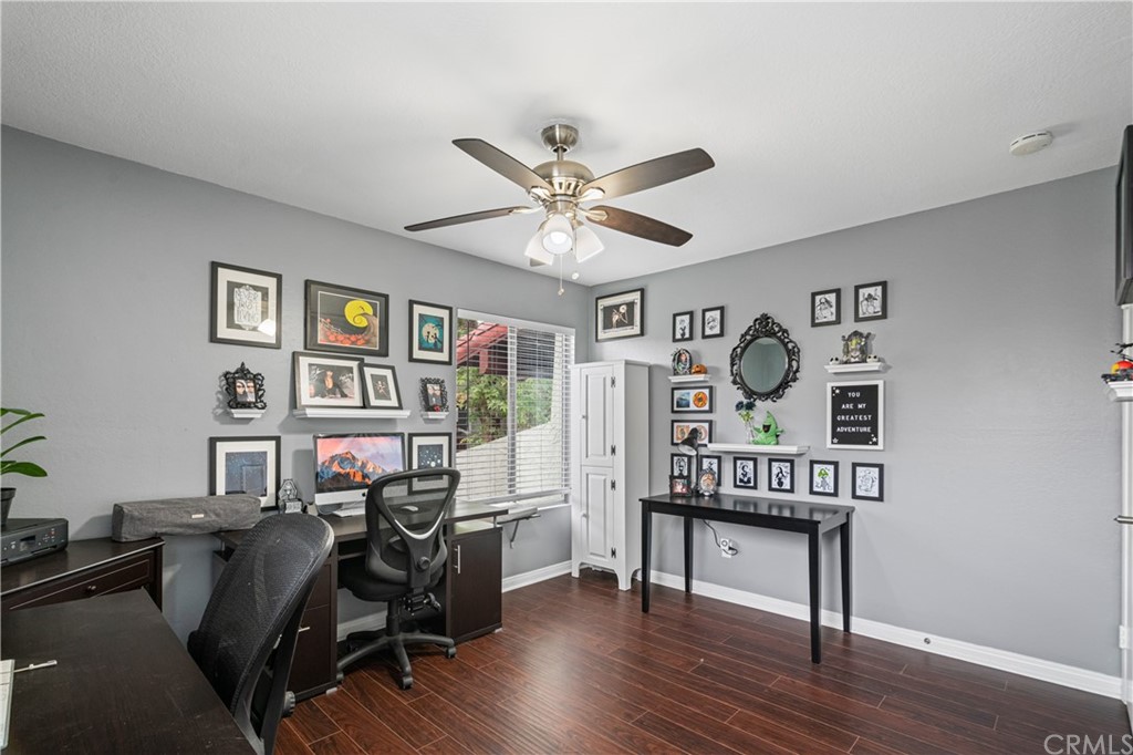 1040 West MacArthur Boulevard, Unit 104 Santa Ana, CA 92707 - Photo 17 of 30 a view of a workspace with furniture and wooden floor