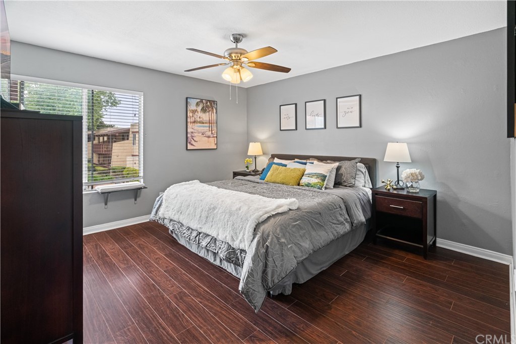 1040 West MacArthur Boulevard, Unit 104 Santa Ana, CA 92707 - Photo 18 of 30 a bedroom with a bed and a window