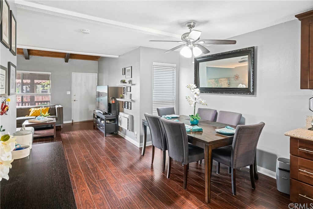 1040 West MacArthur Boulevard, Unit 104 Santa Ana, CA 92707 - Photo 6 of 30 a view of a livingroom and dining room