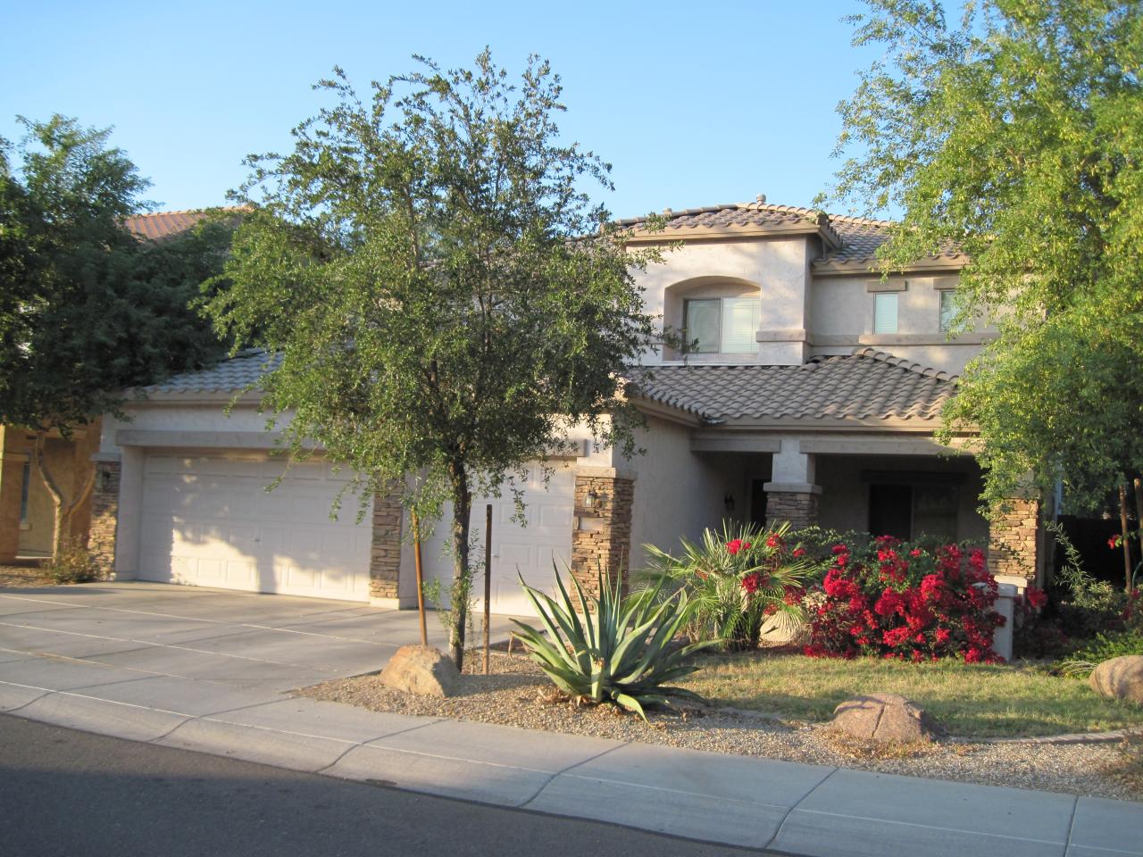9322 West Rascon Loop Phoenix, AZ 85037 - Photo 1 of 3 Front Elevation