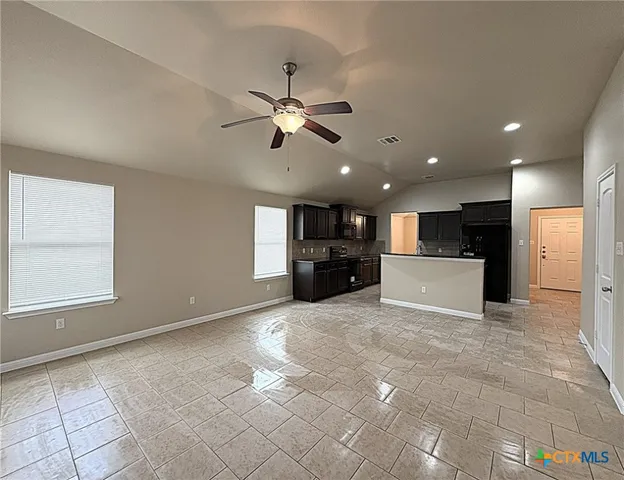 a view of kitchen with a sink and cabinet