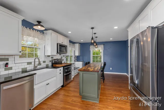 $430,000 | 5450 Golfcrest Court Southwest, Wyoming, MI 49509