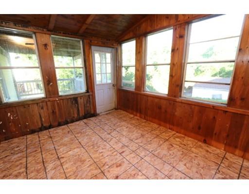 17 Moon Street Southbridge, MA 01550 - Photo 13 of 19 a view of an empty room with wooden floor and a window