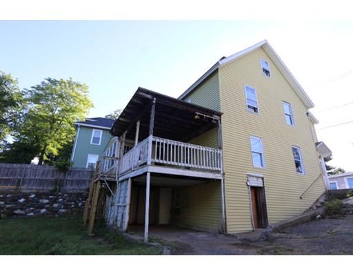 17 Moon Street Southbridge, MA 01550 - Photo 3 of 19 a front view of a house with a yard