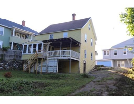 17 Moon Street Southbridge, MA 01550 - Photo 4 of 19 a front view of a house with a garden