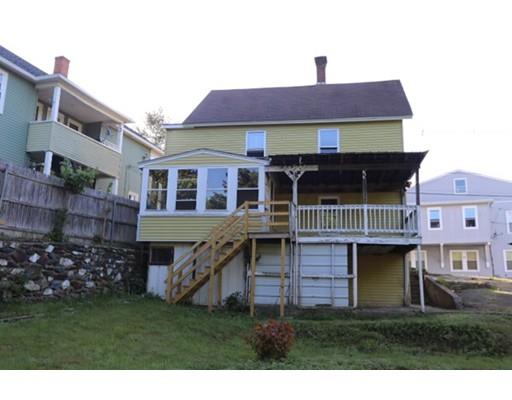 17 Moon Street Southbridge, MA 01550 - Photo 5 of 19 a front view of a house with a garden