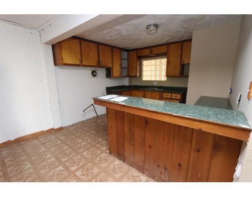 17 Moon Street Southbridge, MA 01550 - Photo 8 of 19 a kitchen with kitchen island sink and window