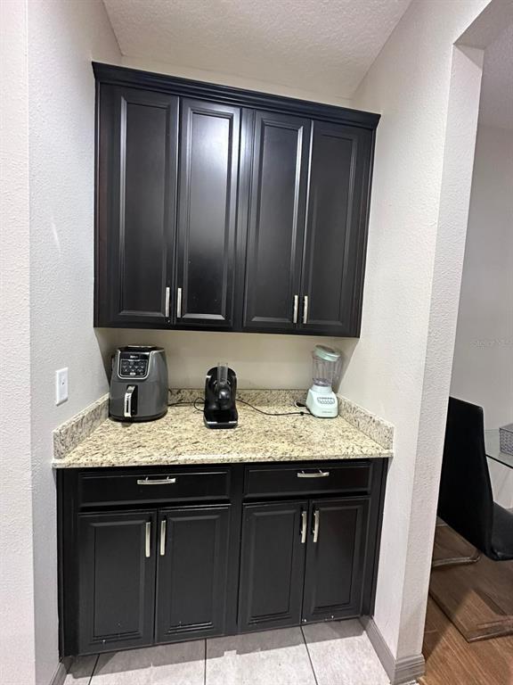 3100 Rocky River Road Kissimmee, FL 34746 - Photo 12 of 33 a view of kitchen island granite countertop sink