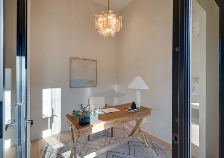 a bathroom with a shower and a sink