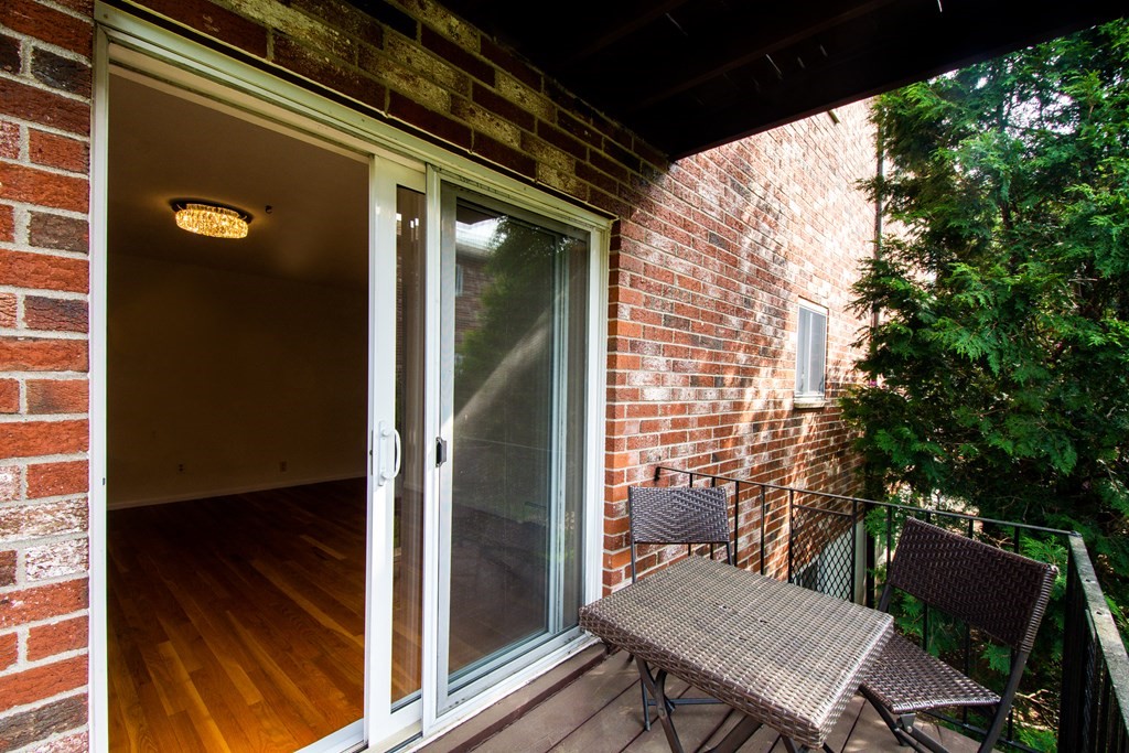 41 Westgate Road, Unit 3 Chestnut Hill, MA 02467 - Photo 18 of 18 a view of a balcony