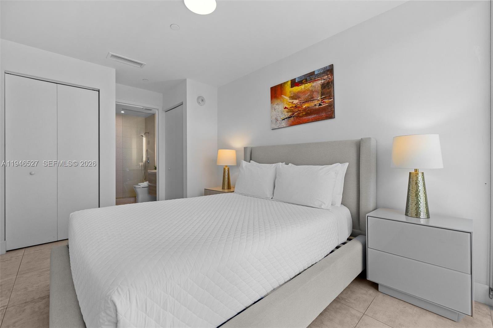 239 Southwest 9th Street, Unit 2304 Miami, FL 33130 - Photo 16 of 35 a large white bed in a white room