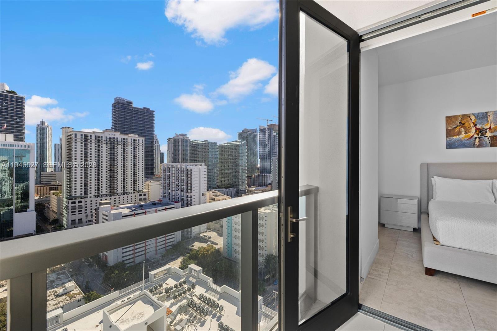 239 Southwest 9th Street, Unit 2304 Miami, FL 33130 - Photo 3 of 35 a view of a city from a balcony