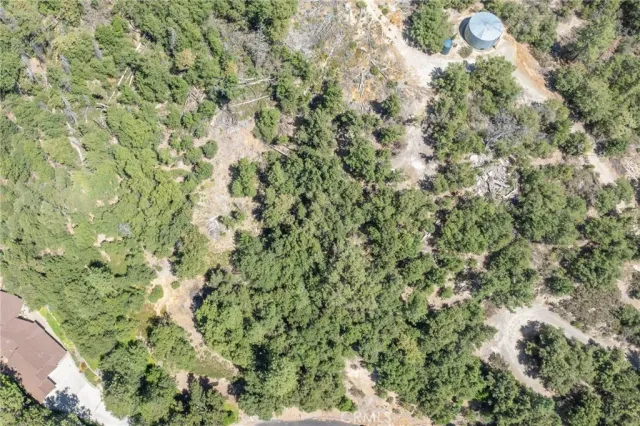 a view of sign board with buildings