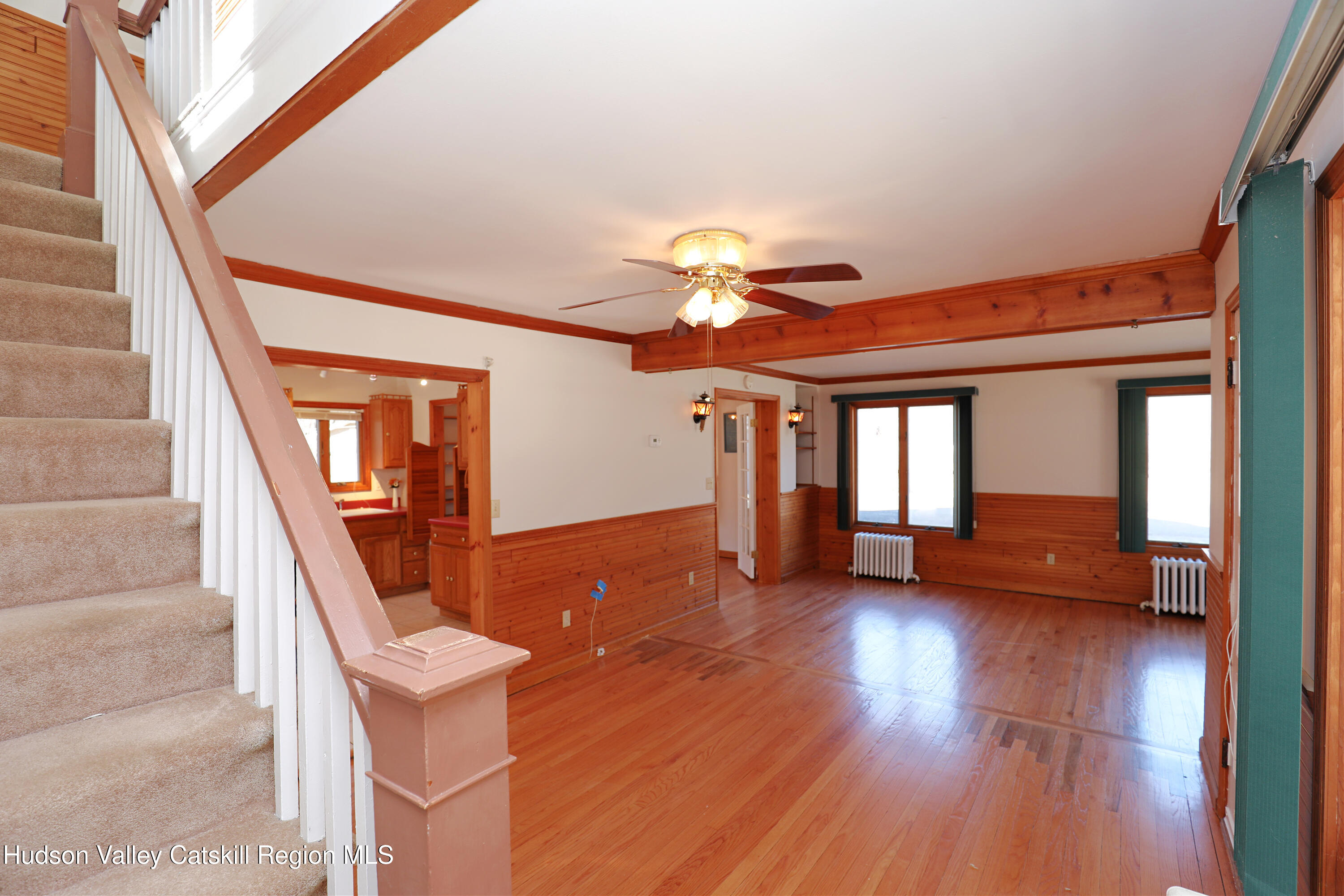 353 West Saugerties Road Saugerties, NY 12477 - Photo 12 of 21 a view of an entryway with wooden floor staircase and a kitchen