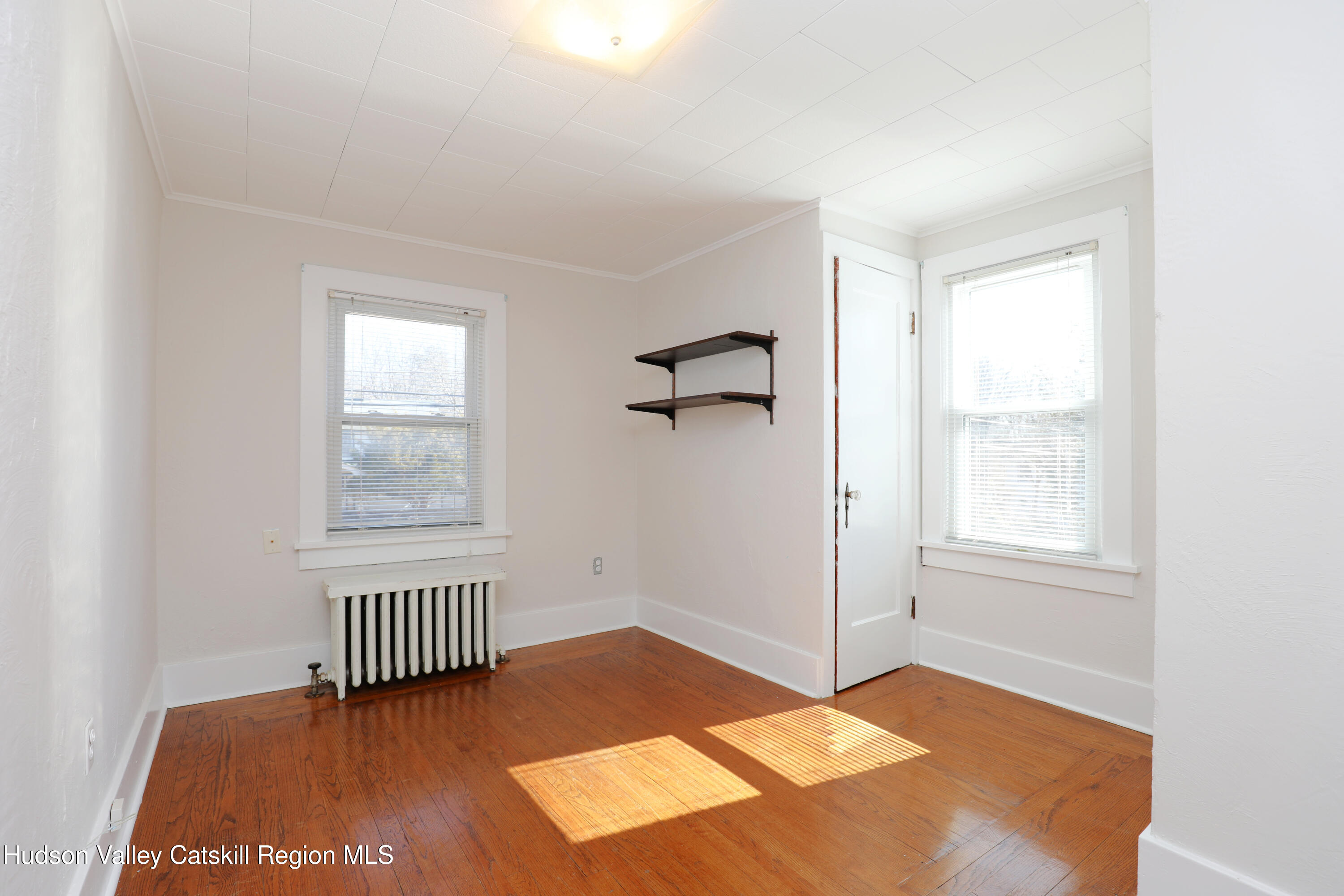 353 West Saugerties Road Saugerties, NY 12477 - Photo 15 of 21 a view of a room with a window and wooden floor
