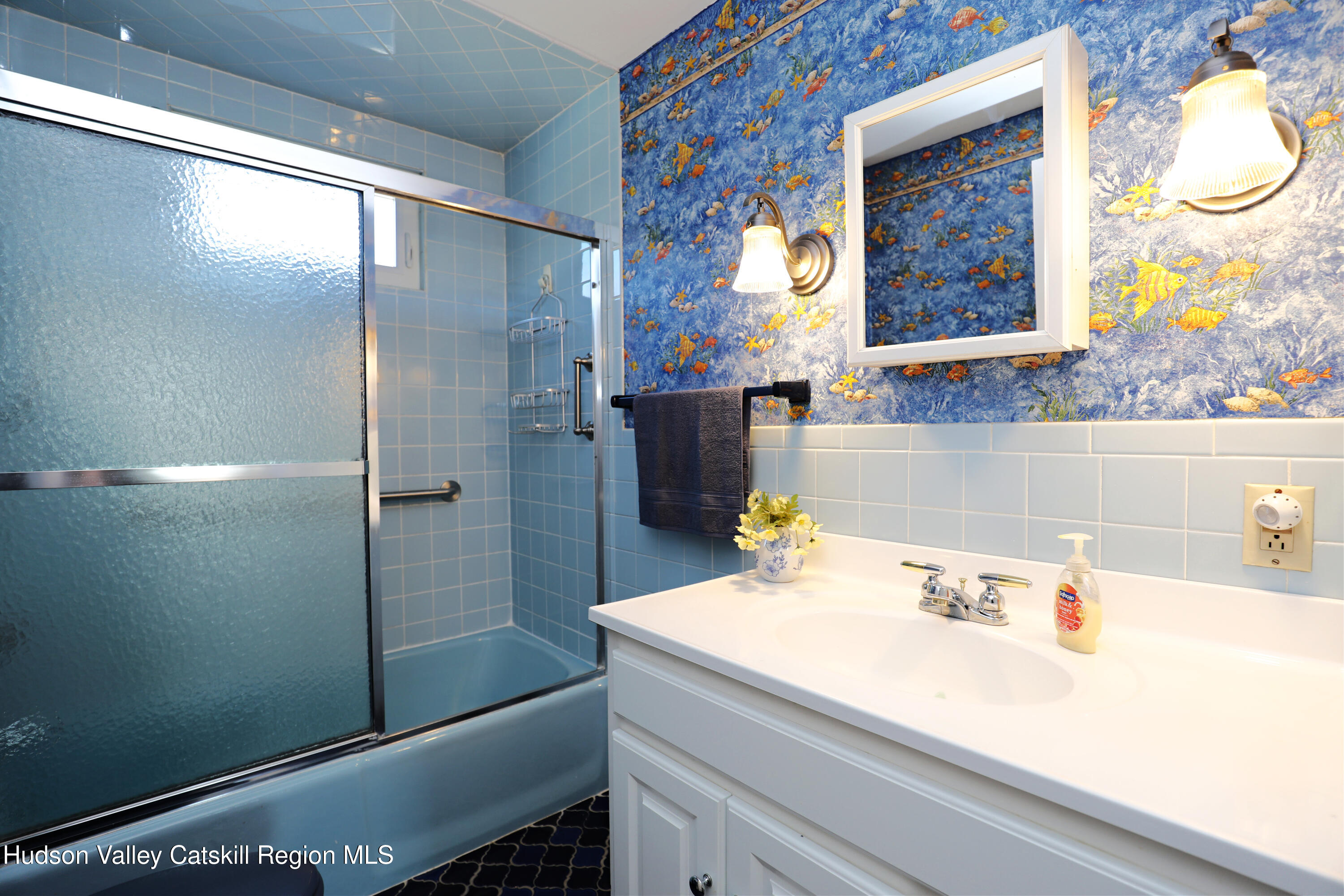 353 West Saugerties Road Saugerties, NY 12477 - Photo 16 of 21 a bathroom with a sink and a mirror