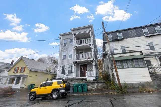 a car parked in front of a building