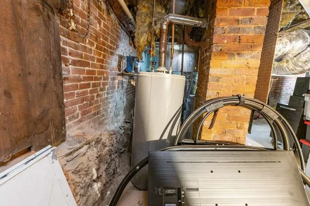 a view of a bathroom with a sink and mirror