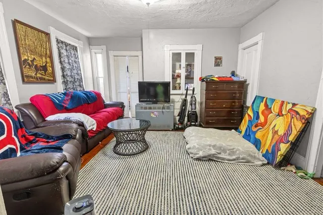 a bedroom with furniture and a bed