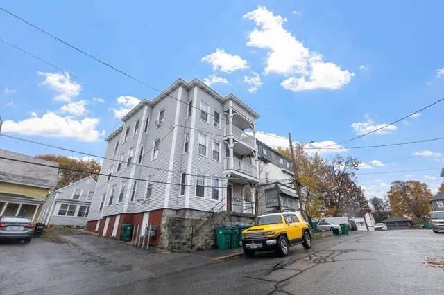 a car parked in front of a building