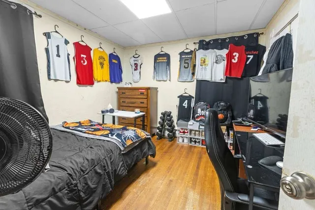 a bed room with a bed and a walk in closet