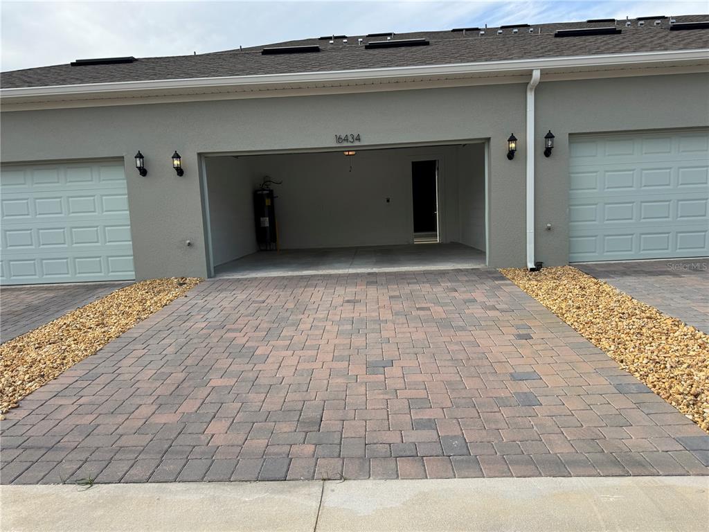 16434 Hamlin Hills Road Winter Garden, FL 34787 - Photo 44 of 50 a front view of a house