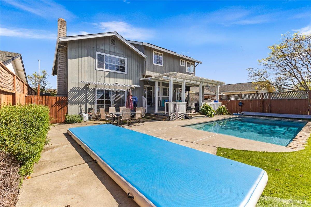 4457 Graywhaler Lane Rohnert Park, CA 94928 - Photo 40 of 51 a front view of house and yard with swimming pool and furniture