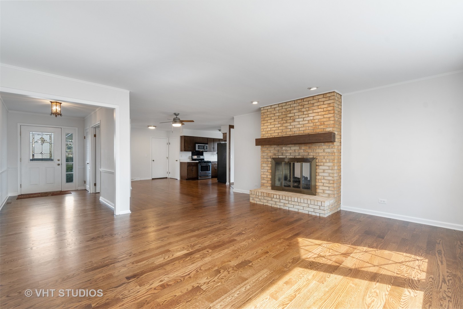 972 West Bauer Road Naperville, IL 60563 - Photo 14 of 32 a view of an empty room and fire place