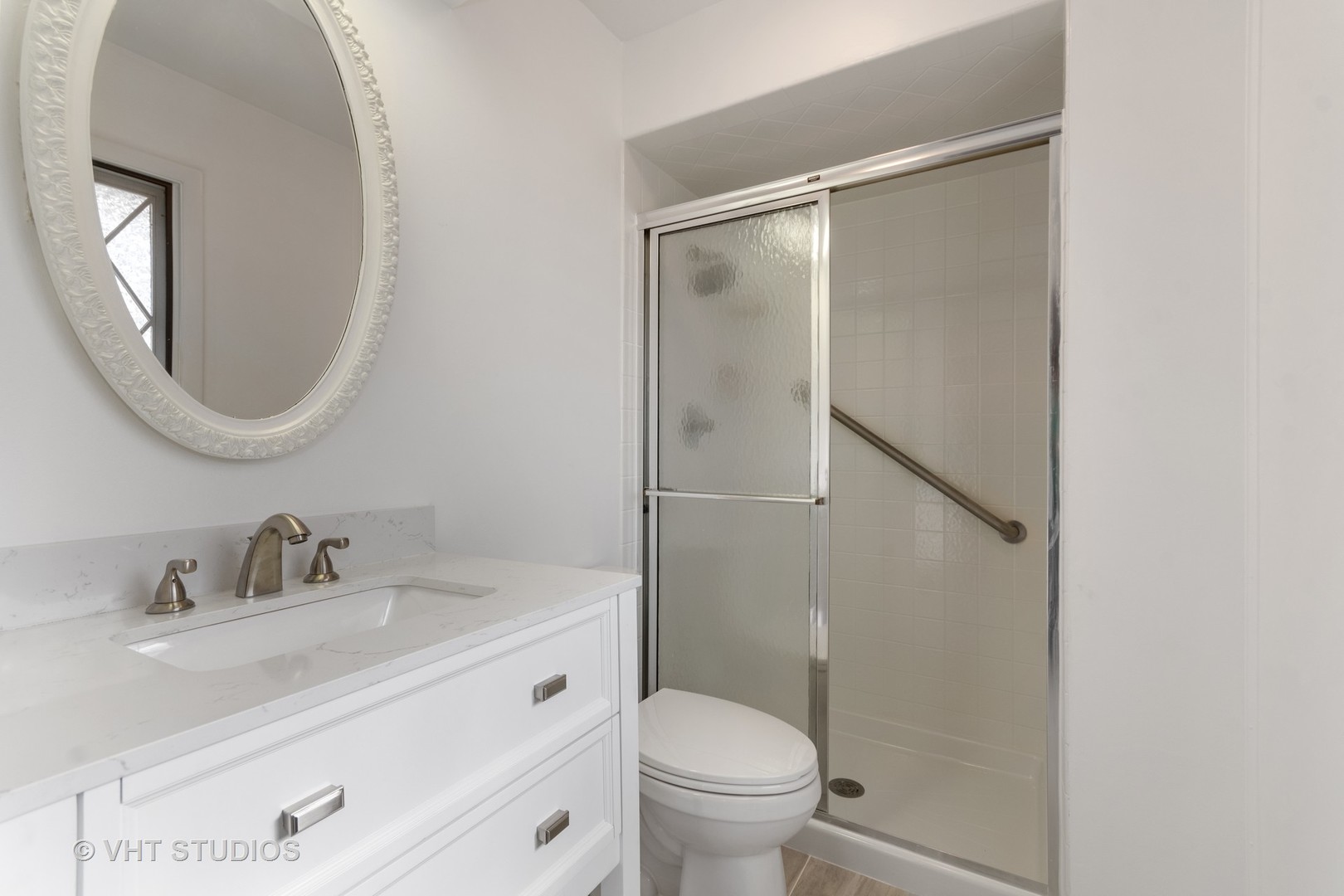 972 West Bauer Road Naperville, IL 60563 - Photo 21 of 32 a bathroom with a granite countertop sink toilet and shower