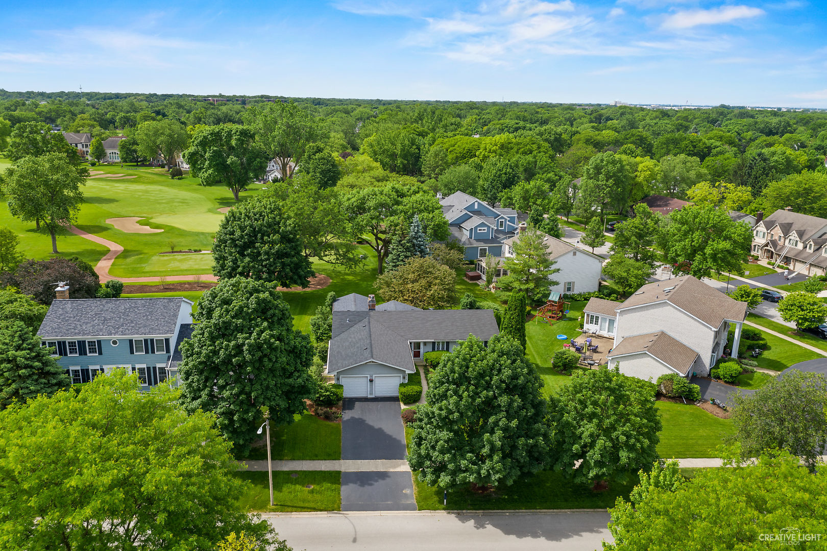 972 West Bauer Road Naperville, IL 60563 - Photo 23 of 32 an aerial view of a house with garden space and outdoor seating