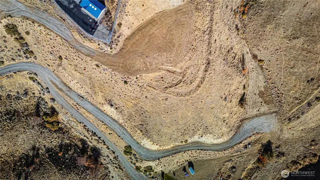 a view of a backyard of a house