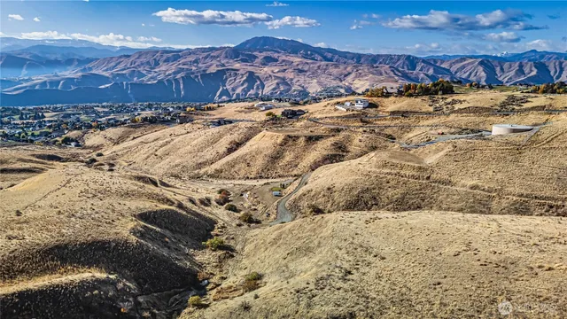 a view of a dry yard covered with snow