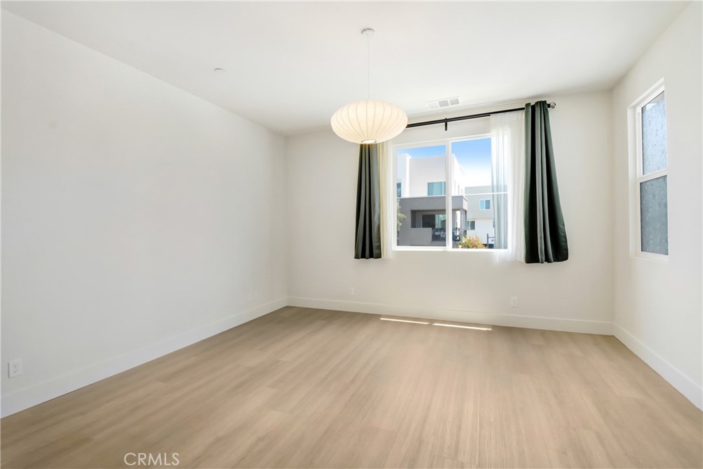 181 Novel Irvine, CA 92618 - Photo 17 of 22 an empty room with window and mirror
