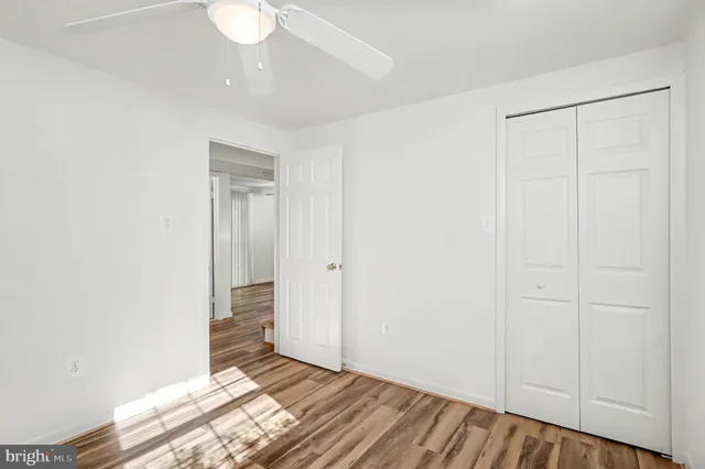 a view of entryway with wooden floor