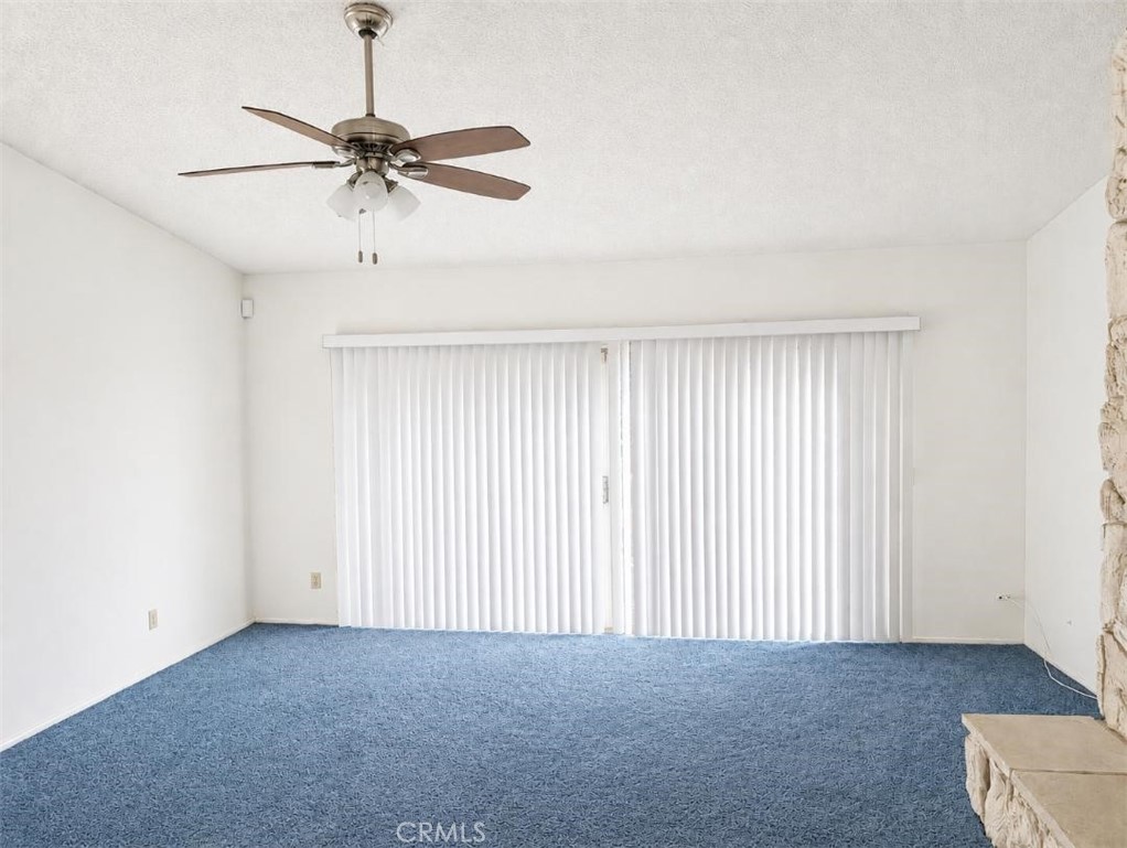 4752 Flying H Road Twentynine Palms, CA 92277 - Photo 13 of 55 a view of an empty room with a window