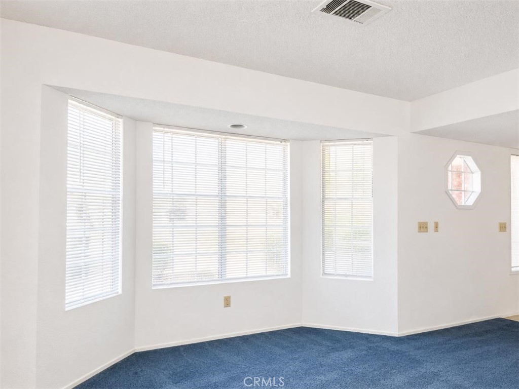 4752 Flying H Road Twentynine Palms, CA 92277 - Photo 21 of 55 an empty room with windows
