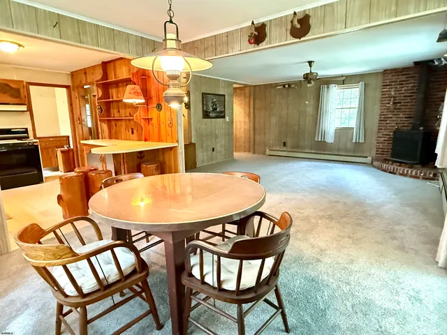 a view of a chairs and table in the patio