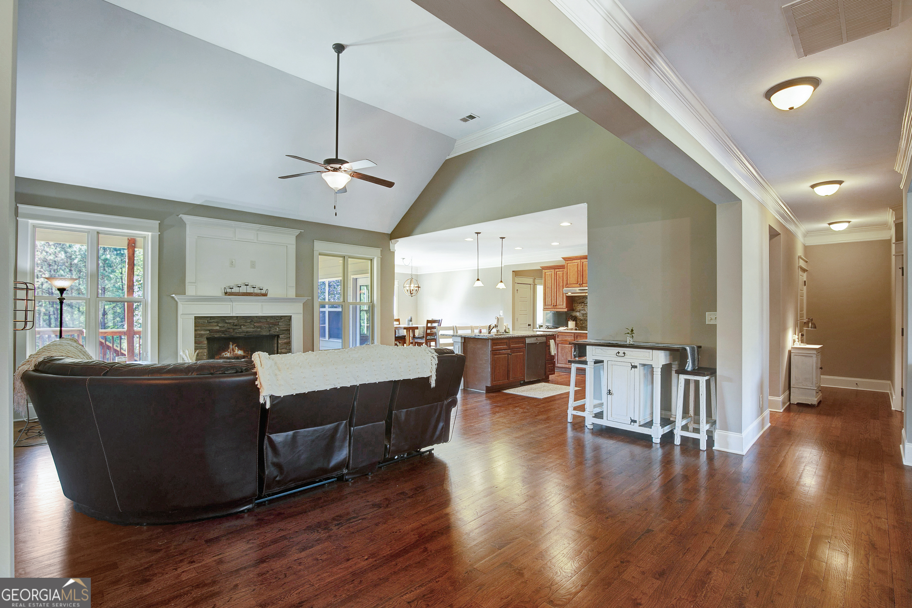 137 Kenmare Row Tyrone, GA 30290 - Photo 12 of 54 a living room with fireplace furniture and a wooden floor